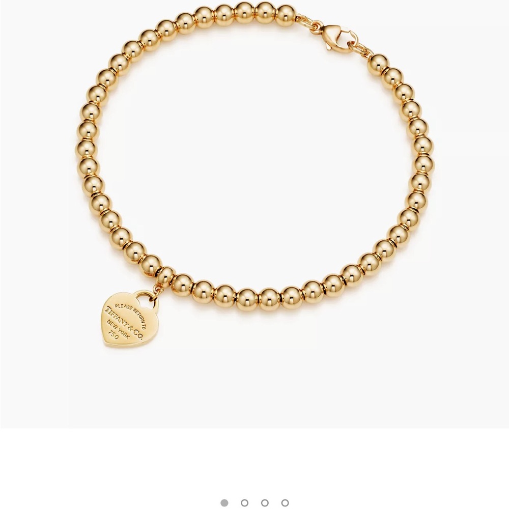 Tiffany & Co  18K Gold Beaded Bracelet with Heart Charm
